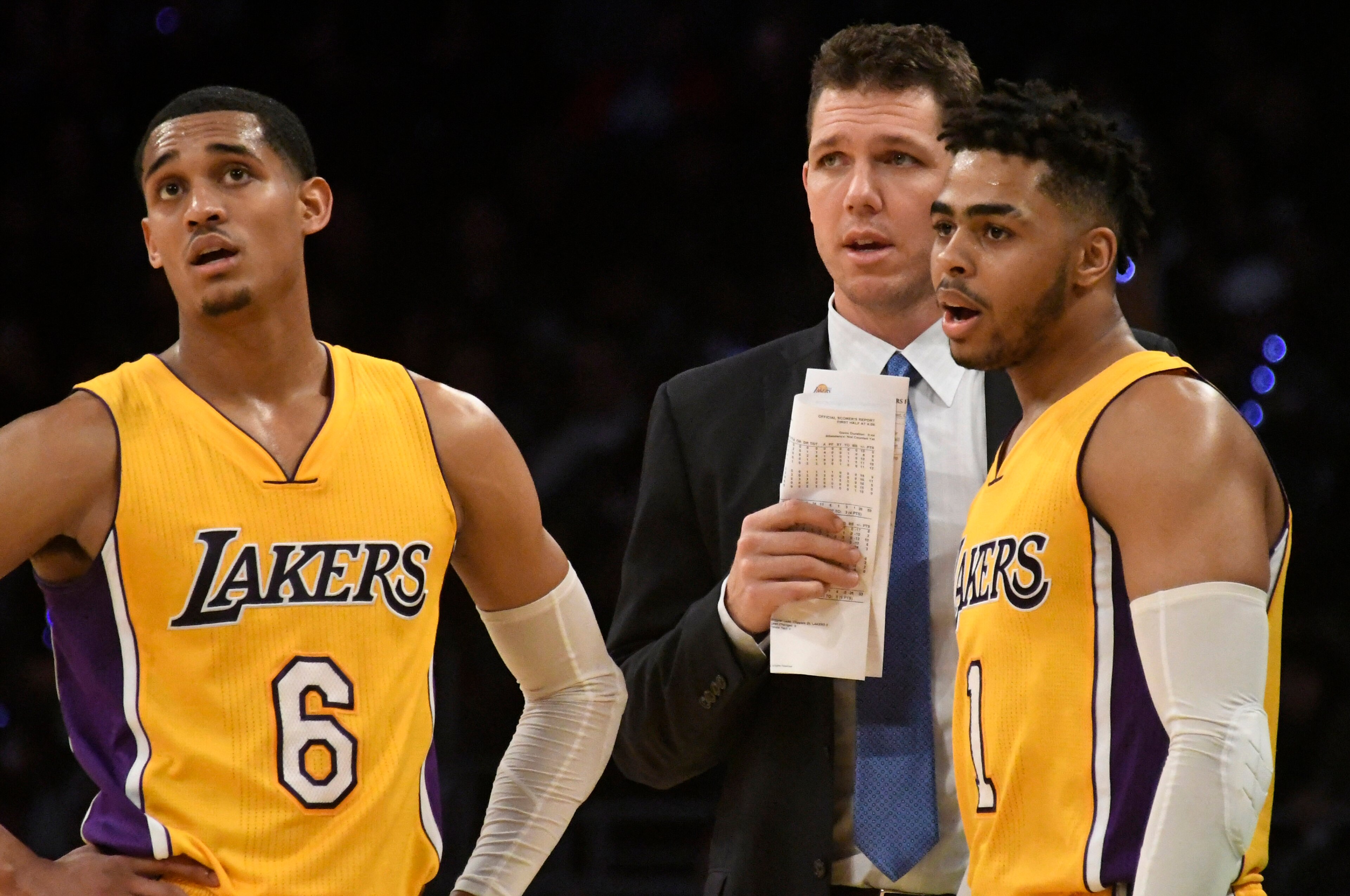 Mar 21, 2017; Los Angeles, CA, USA; Los Angeles Lakers head coach Luke Walton talks to guard Jordan Clarkson (6) and guard D'Angelo Russell (1) in the first half against the LA Clippers at Staples Center. Mandatory Credit: Richard Mackson-USA TODAY Sports