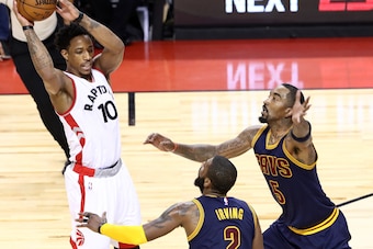 TORONTO, CANADA - MAY 5:  DeMar DeRozan #10 of the Toronto Raptors passes the ball against the Cleveland Cavaliers during Game Three of the Eastern Conference Semifinals of the 2017 NBA Playoffs on May 5, 2017 at the Air Canada Centre in Toronto, Ontario,