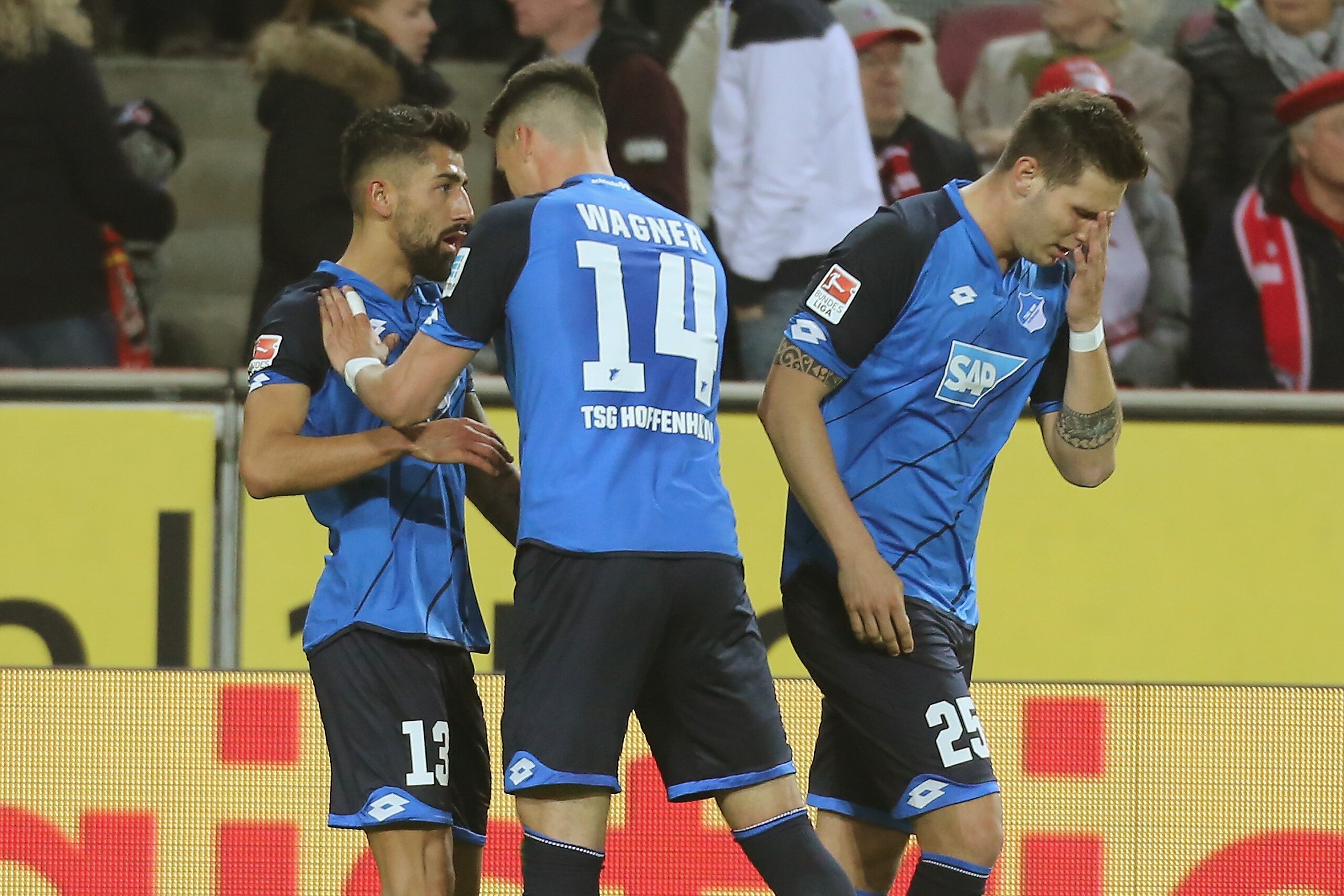COLOGNE, GERMANY - APRIL 21: Kerem Demirbay and Niklas Suele and Sandro Wagner celebrate a goal during the Bundesliga match between 1. FC Koeln and TSG 1899 Hoffenheim at RheinEnergieStadion on April 21, 2017 in Cologne, Germany. (Photo by TF-Images/Getty COLOGNE, GERMANY - APRIL 21: Kerem Demirbay and Niklas Suele and Sandro Wagner celebrate a goal during the Bundesliga match between 1. FC Koeln and TSG 1899 Hoffenheim at RheinEnergieStadion on April 21, 2017 in Cologne, Germany. (Photo by TF-Images/Getty