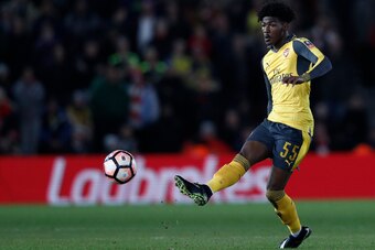 Arsenal's English midfielder Ainsley Maitland-Niles crosses the ball during the English FA Cup fourth round football match between Southampton and Arsenal at St Mary's in Southampton, southern England on January 28, 2017. / AFP / Adrian DENNIS / RESTRICTE