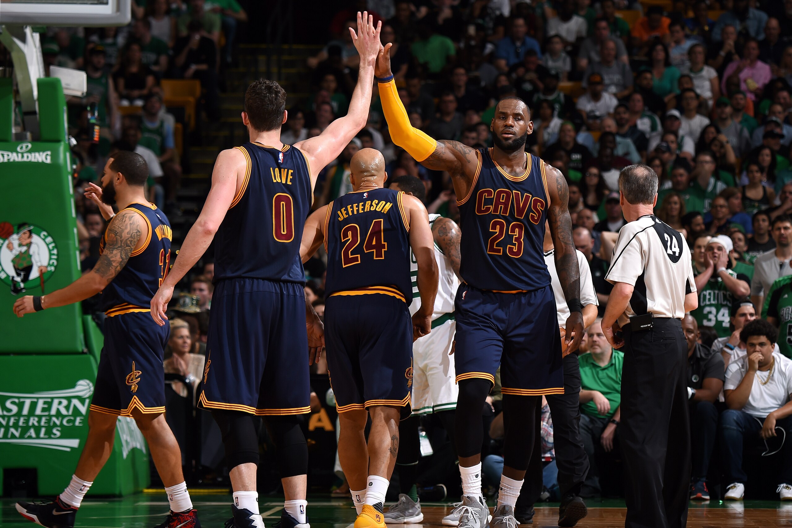 BOSTON, MA - MAY 17: LeBron James #23 and Kevin Love #0 of the Cleveland Cavaliers high five each other during the game against the Boston Celtics during Game One of the Eastern Conference Finals of the 2017 NBA Playoffs on May 17, 2017 at the TD Garden i