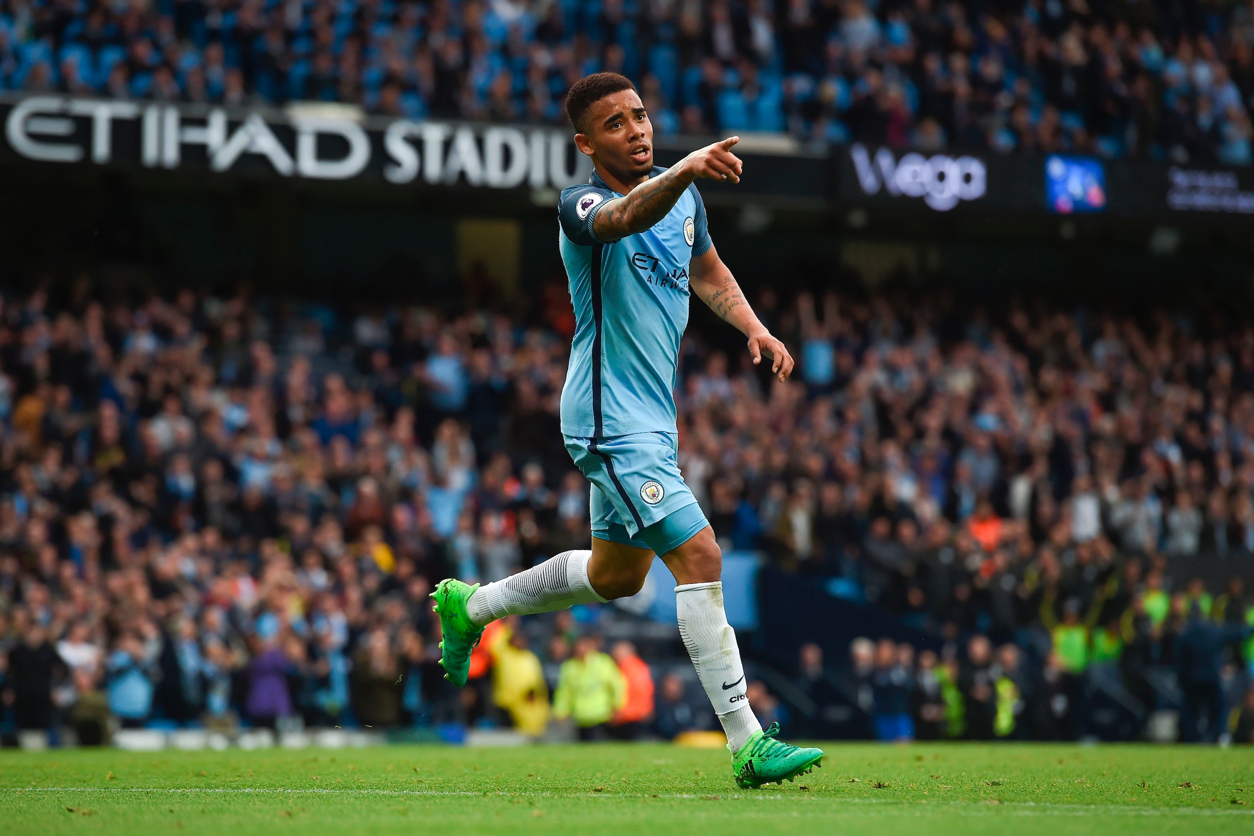 Manchester City's Brazilian striker Gabriel Jesus celebrates scoring the opening goal during the English Premier League football match between Manchester City and West Bromwich Albion at the Etihad Stadium in Manchester, north west England, on May 16, 201