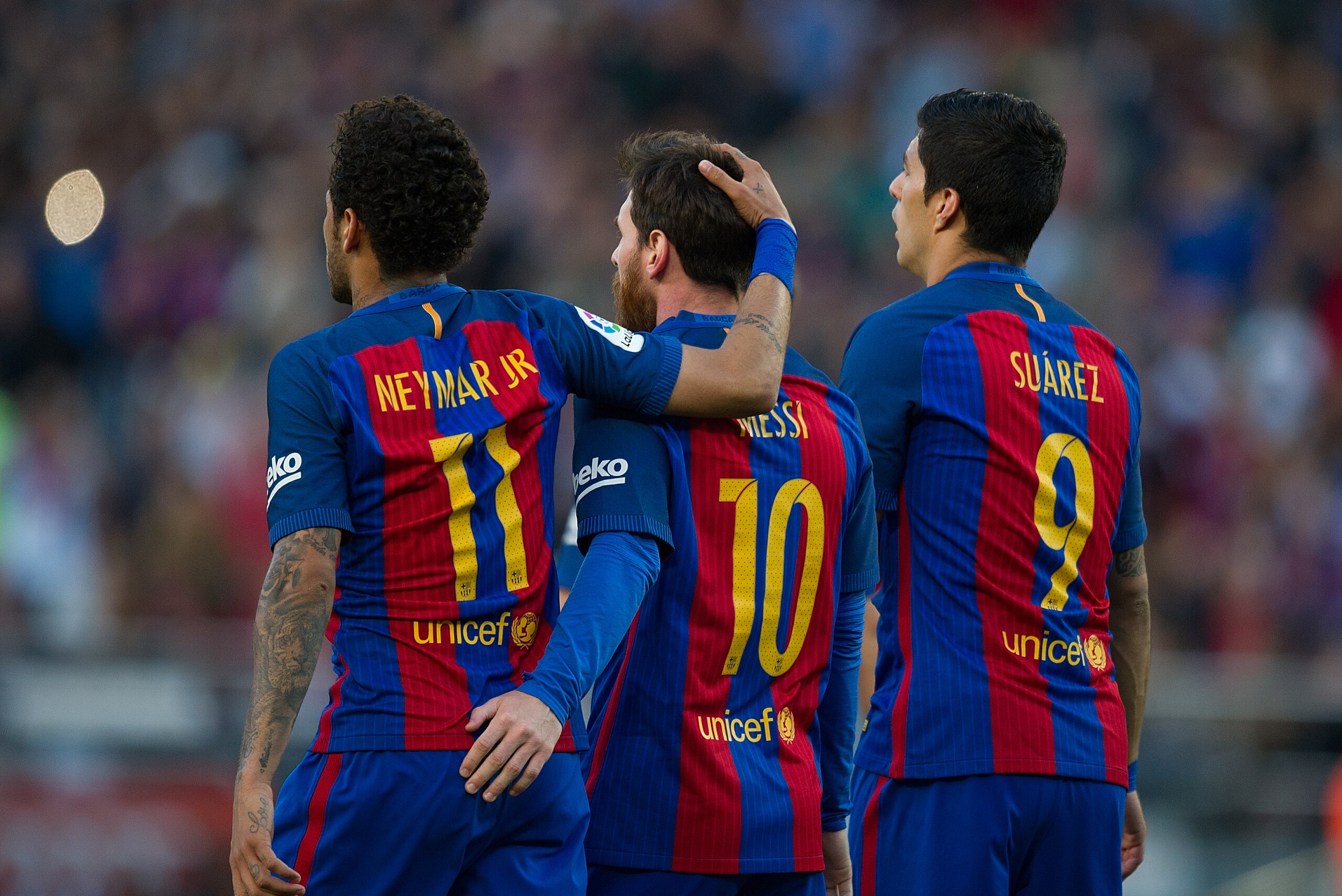 BARCELONA, SPAIN - MAY 06:  Lionel Messi of FC Barcelona celebrates with Neymar and Luis Suarez after scoring his team's 3rd goal from the penalty spot during of the La Liga match between FC Barcelona and Villarreal CF at Camp Nou stadium on May 6, 2017 i