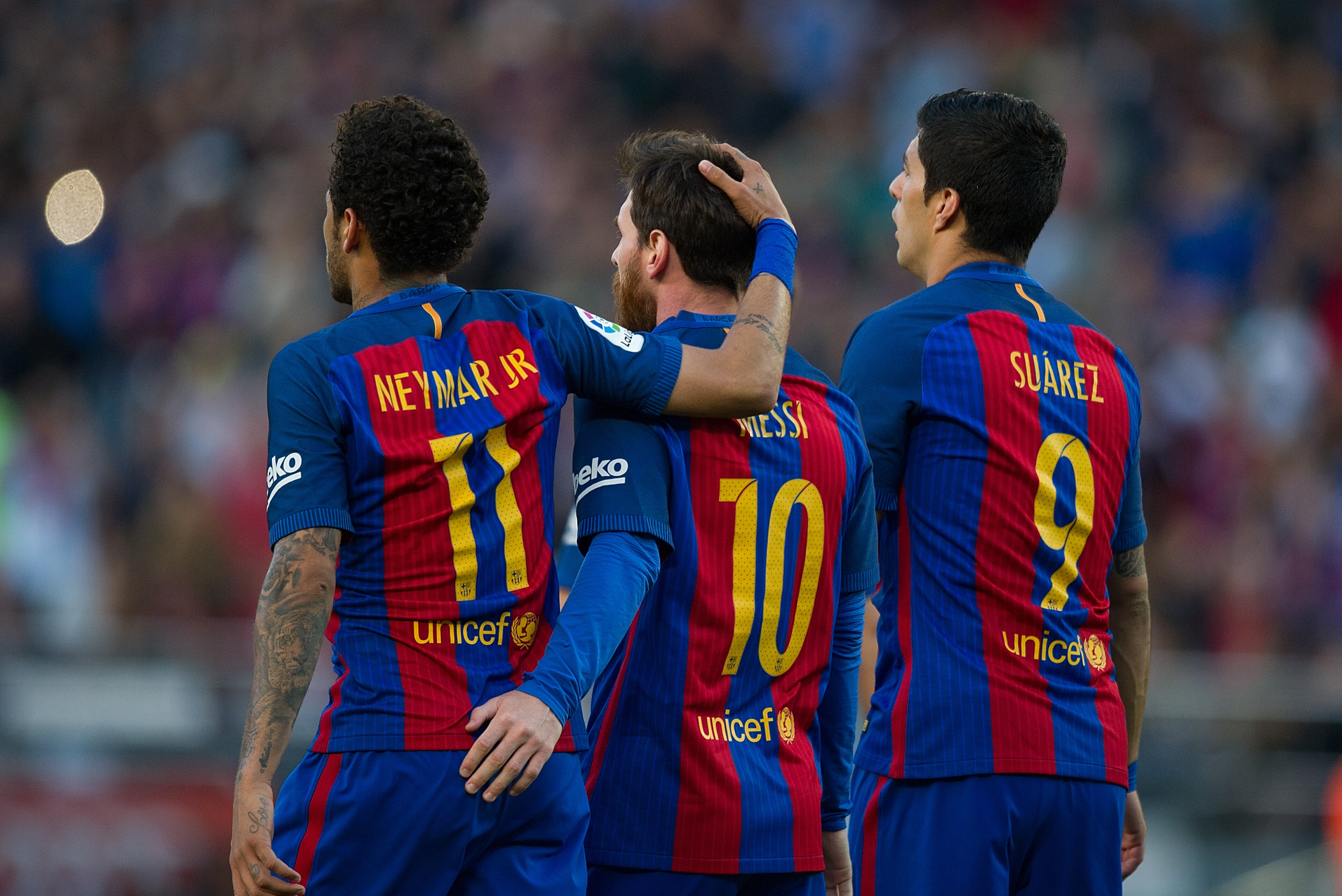 BARCELONA, SPAIN - MAY 06:  Lionel Messi of FC Barcelona celebrates with Neymar and Luis Suarez after scoring his team's 3rd goal from the penalty spot during of the La Liga match between FC Barcelona and Villarreal CF at Camp Nou stadium on May 6, 2017 i