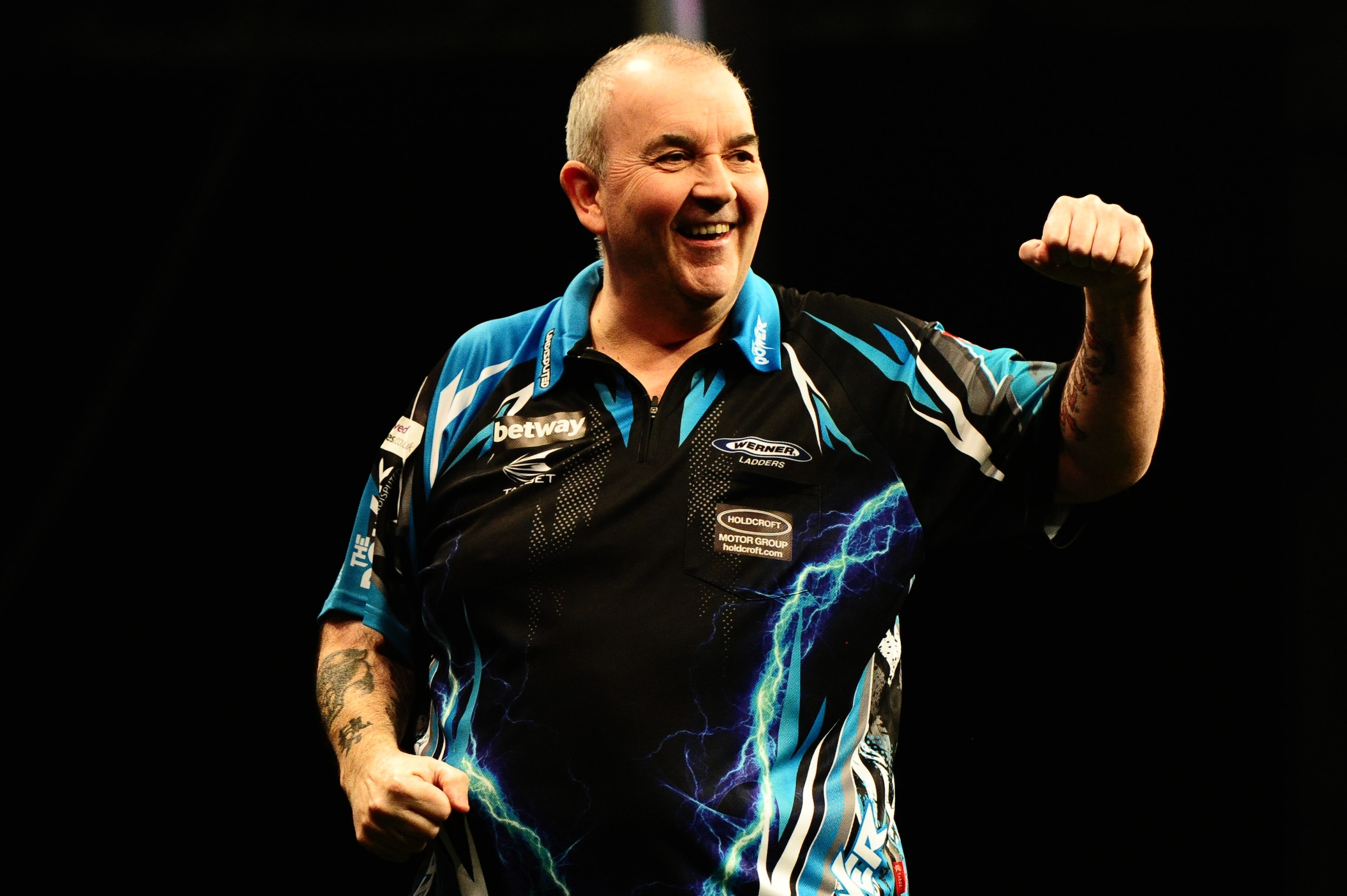 EXETER, UNITED KINGDOM - MARCH 02: Phil Taylor celebrates during Night Five of the Betway Premier League Darts at Westpoint Arena on March 2, 2017 in Exeter, England. (Photo by Harry Trump/Getty Images)