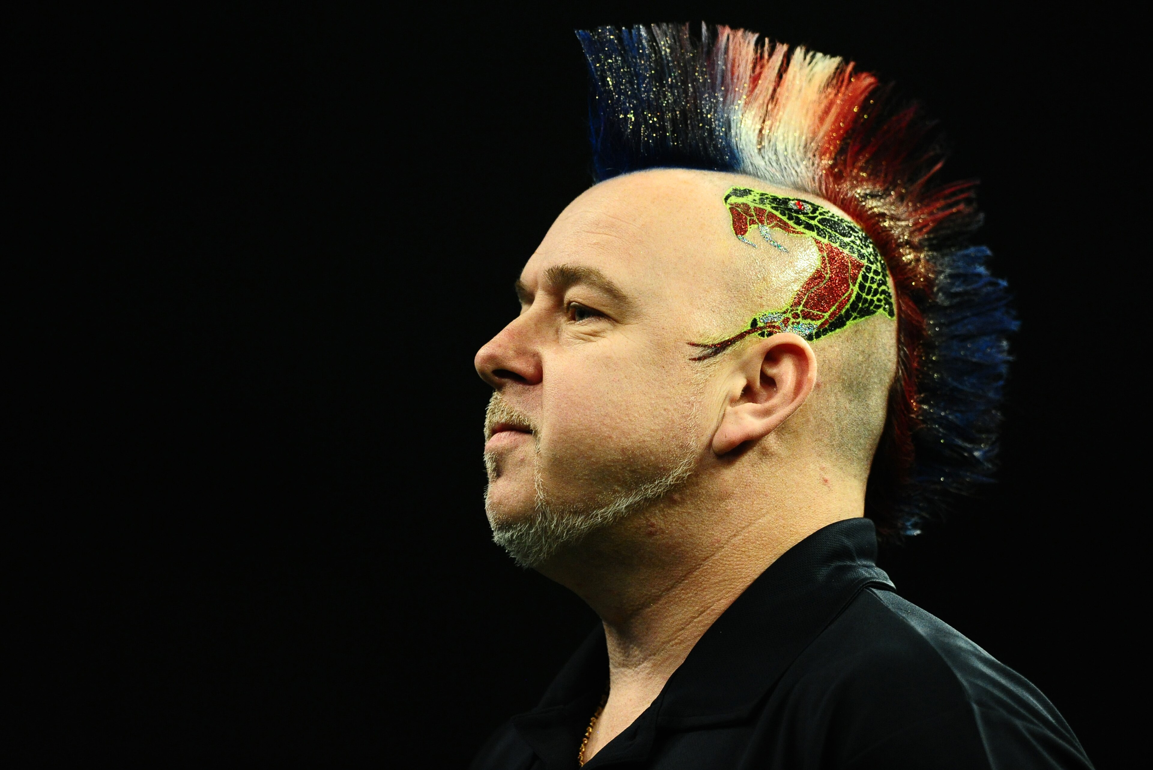 EXETER, UNITED KINGDOM - MARCH 02: Peter Wright looks on during Night Five of the Betway Premier League Darts at Westpoint Arena on March 2, 2017 in Exeter, England. (Photo by Harry Trump/Getty Images)