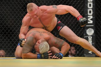 LAS VEGAS, NV - JULY 9: Brock Lesnar punches Mark Hunt during the UFC 200 event at T-Mobile Arena on July 9, 2016 in Las Vegas, Nevada. (Photo by Rey Del Rio/Getty Images)