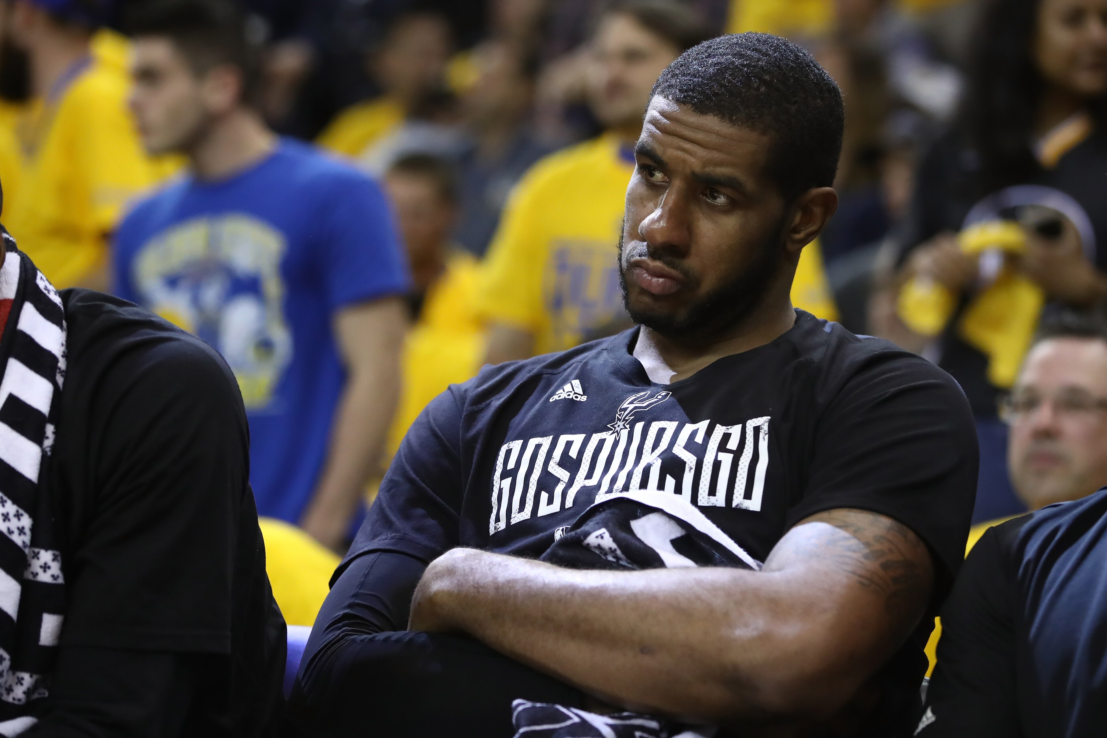 OAKLAND, CA - MAY 16:  LaMarcus Aldridge #12 of the San Antonio Spurs sits on the bench in the final minutes of their 136-100 loss to the Golden State Warriors in Game Two of the NBA Western Conference Finals at ORACLE Arena on May 16, 2017 in Oakland, Ca