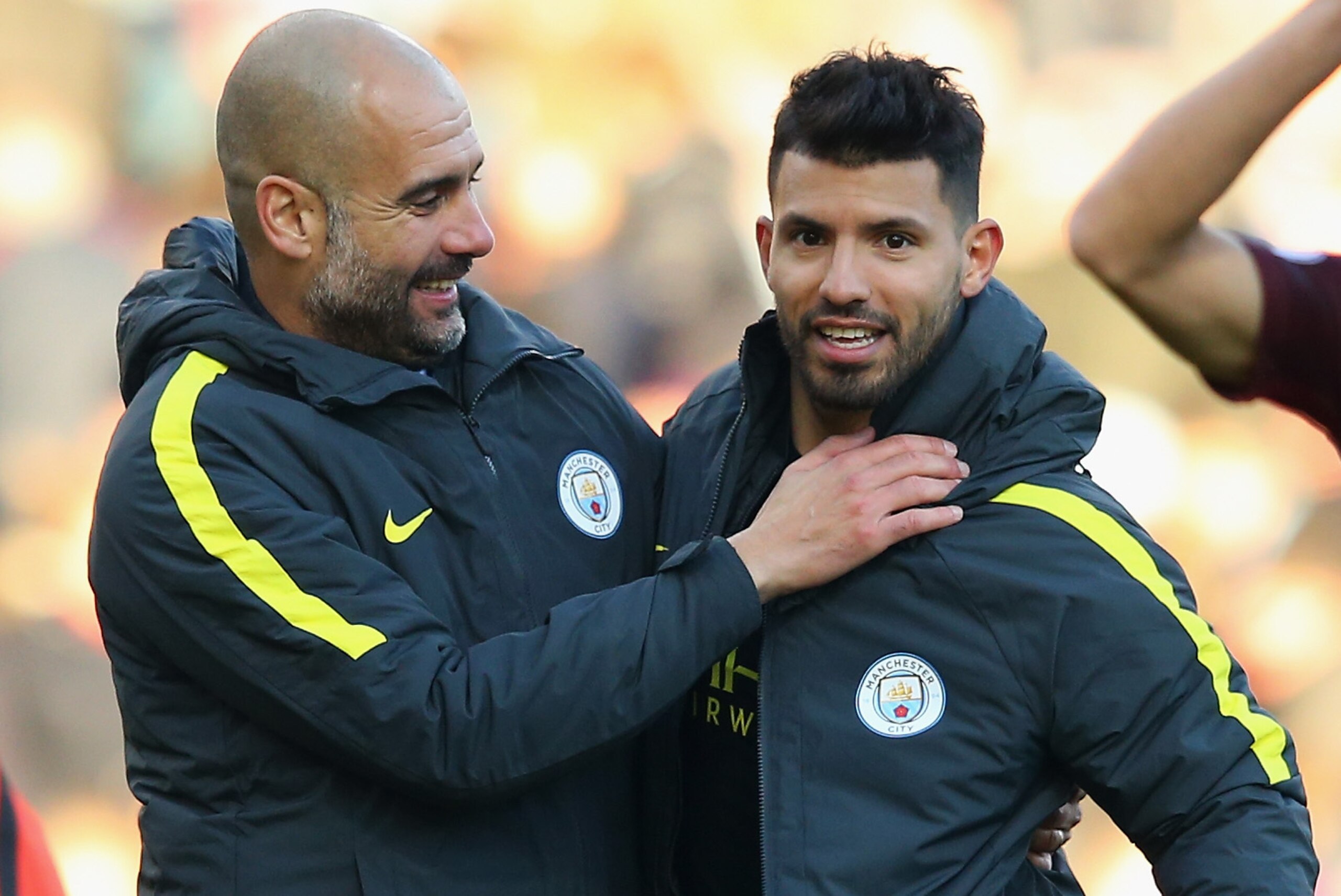 BURNLEY, ENGLAND - NOVEMBER 26:  Josep Guardiola, Manager of Manchester City congratulates Sergio Aguero after their 2-1 win in the Premier League match between Burnley and Manchester City at Turf Moor on November 26, 2016 in Burnley, England.  (Photo by 