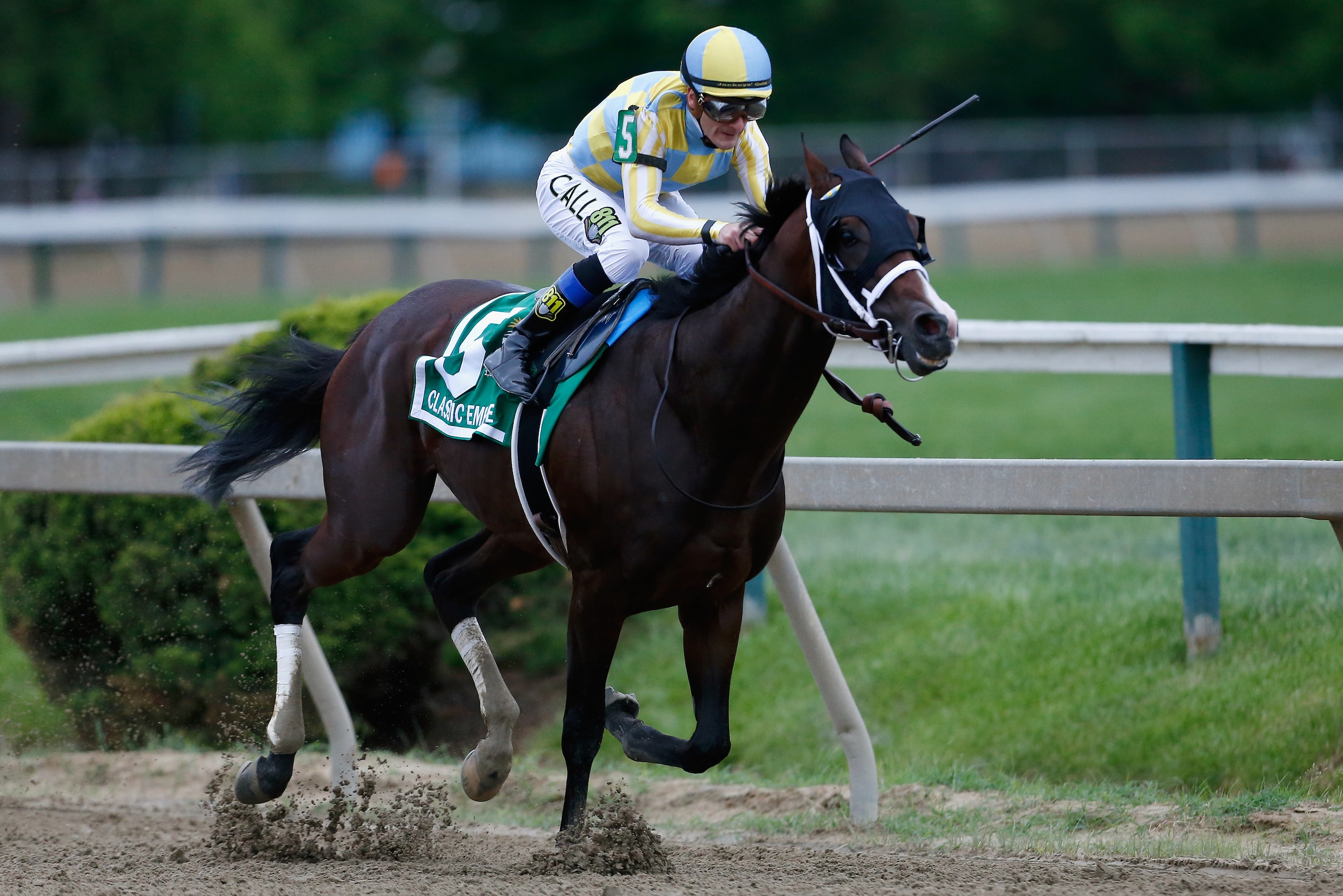BALTIMORE, MD - MAY 20:  Classic Empire #5 ridden by Julien Leparoux leads the field around the fourth turn during the 142nd running of the Preakness Stakes at Pimlico Race Course on May 20, 2017 in Baltimore, Maryland.  (Photo by Matt Hazlett/Getty Image