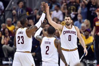 May 21, 2017; Cleveland, OH, USA; Cleveland Cavaliers forward LeBron James (23) and forward Kevin Love (0) celebrate during the first quarter against the Boston Celtics in game three of the Eastern conference finals of the NBA Playoffs at Quicken Loans Ar