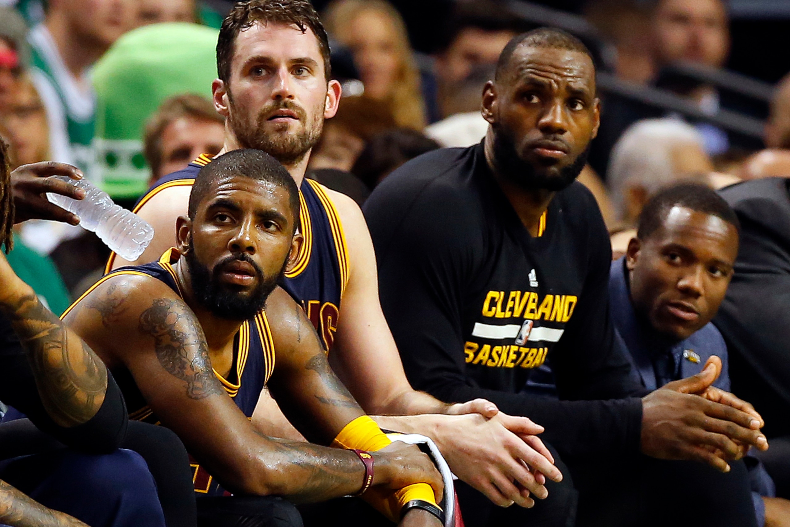 May 19, 2017; Boston, MA, USA; Cleveland Cavaliers guard Kyrie Irving (left), forward Kevin Love (center) and forward LeBron James (right) look on from the bench during the second half against the Boston Celtics in game two of the Eastern conference final