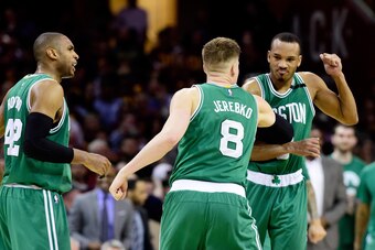 CLEVELAND, OH - MAY 21:  Avery Bradley #0 celebrates with Jonas Jerebko #8 of the Boston Celtics after their 111 to 108 win over the Cleveland Cavaliers during Game Three of the 2017 NBA Eastern Conference Finals at Quicken Loans Arena on May 21, 2017 in 