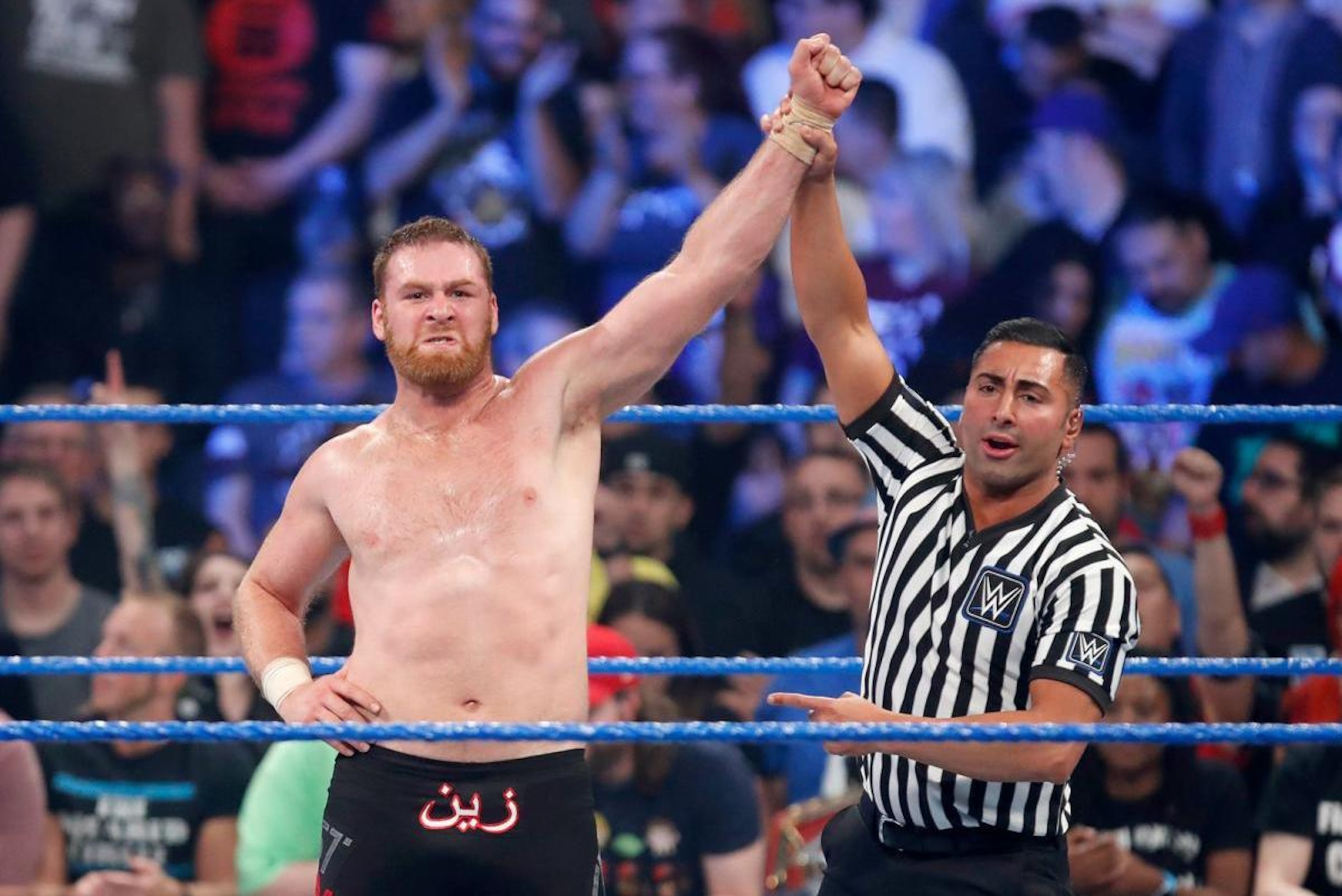 Sami Zayn celebrates his Backlash victory.