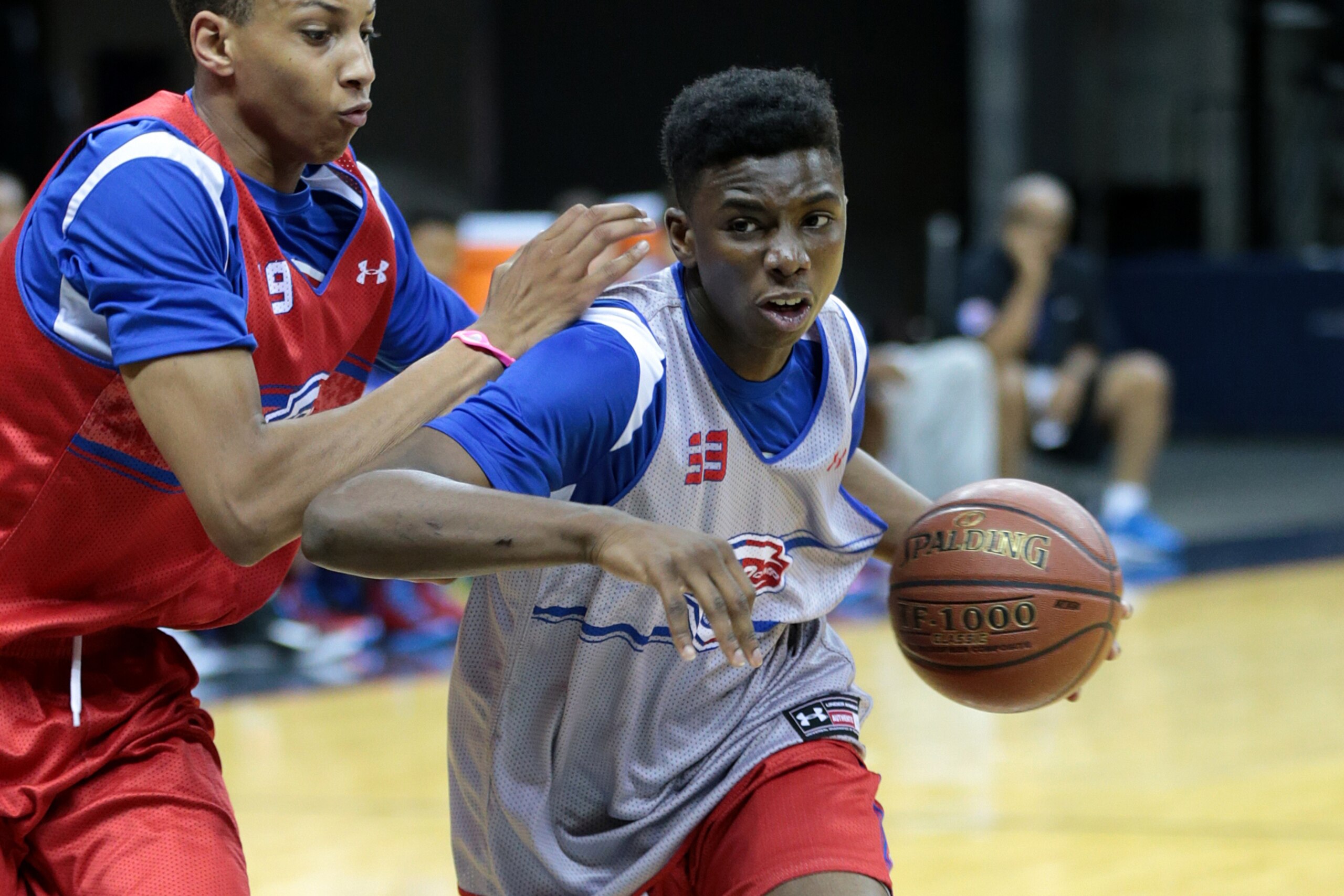 CHARLOTTESVILLE, VA - JUNE 19: Hamidou Diallo #33 in white goes for a layup during the NBPA Top 100 Camp on June 19, 2015 at John Paul Jones Arena in Charlottesville, Virginia. (Photo by Kelly Kline/Getty Images)