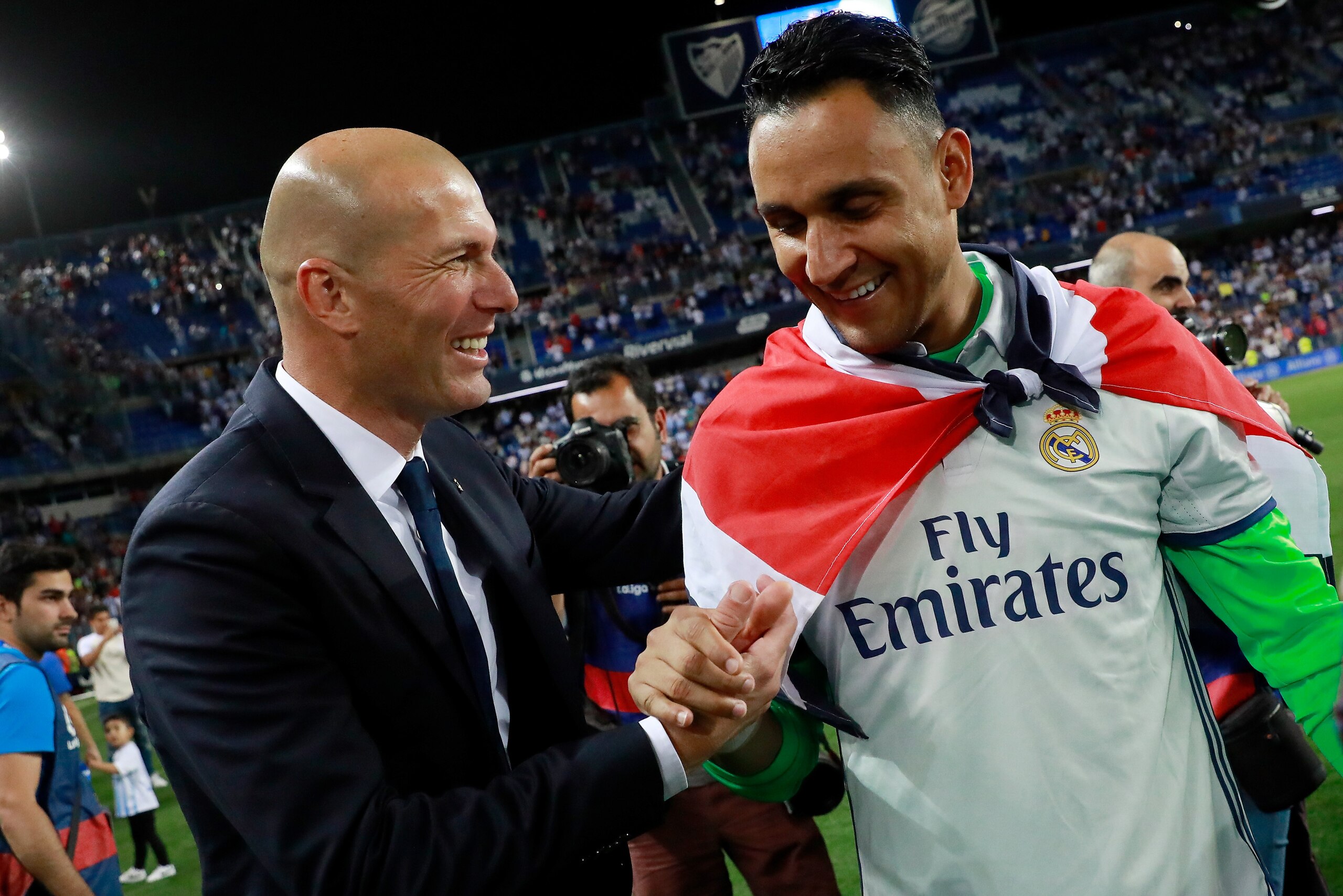 MALAGA, SPAIN - MAY 21: Zinedine Zidane, Manager of Real Madrid celebrates with Keylor Navas of Real Madrid following the La Liga match between Malaga and Real Madrid at La Rosaleda Stadium on May 21, 2017 in Malaga, Spain. (Photo by Gonzalo Arroyo More MALAGA, SPAIN - MAY 21: Zinedine Zidane, Manager of Real Madrid celebrates with Keylor Navas of Real Madrid following the La Liga match between Malaga and Real Madrid at La Rosaleda Stadium on May 21, 2017 in Malaga, Spain. (Photo by Gonzalo Arroyo More