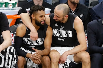 SAN ANTONIO, TX - MAY 22:  Manu Ginobili #20 (R) reacts on the bench with Patty Mills #8 and Pau Gasol #16 of the San Antonio Spurs in the second half against the Golden State Warriors during Game Four of the 2017 NBA Western Conference Finals at AT&T Cen