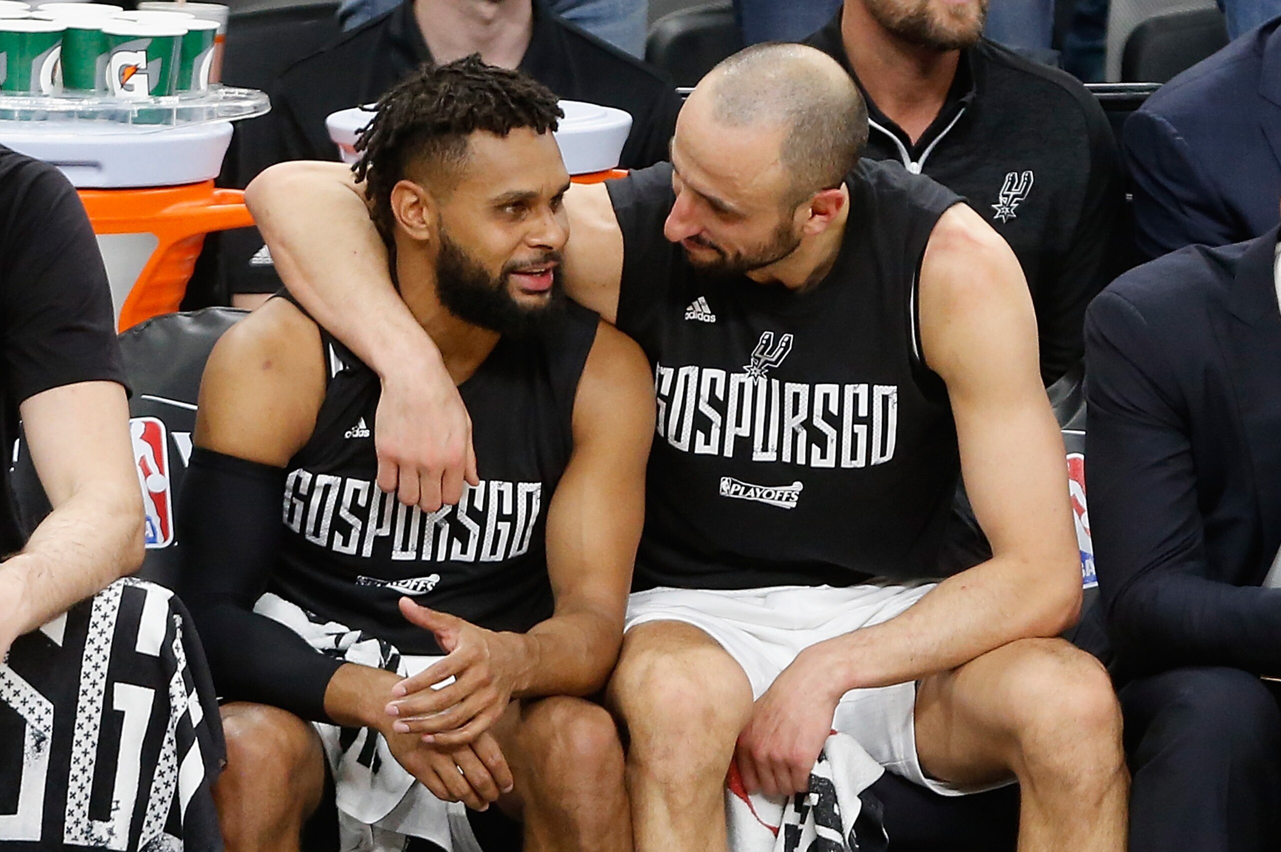 SAN ANTONIO, TX - MAY 22:  Manu Ginobili #20 (R) reacts on the bench with Patty Mills #8 and Pau Gasol #16 of the San Antonio Spurs in the second half against the Golden State Warriors during Game Four of the 2017 NBA Western Conference Finals at AT&T Cen