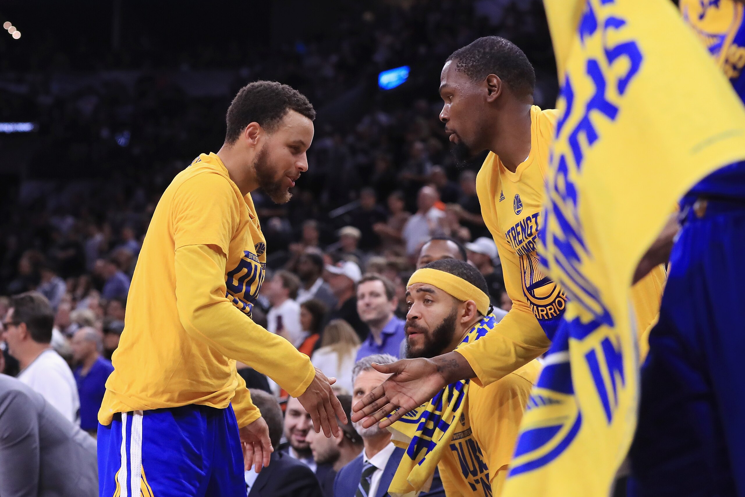SAN ANTONIO, TX - MAY 22:  Stephen Curry #30 high fives Kevin Durant #35 of the Golden State Warriors in the second half against the San Antonio Spurs during Game Four of the 2017 NBA Western Conference Finals at AT&T Center on May 22, 2017 in San Antonio
