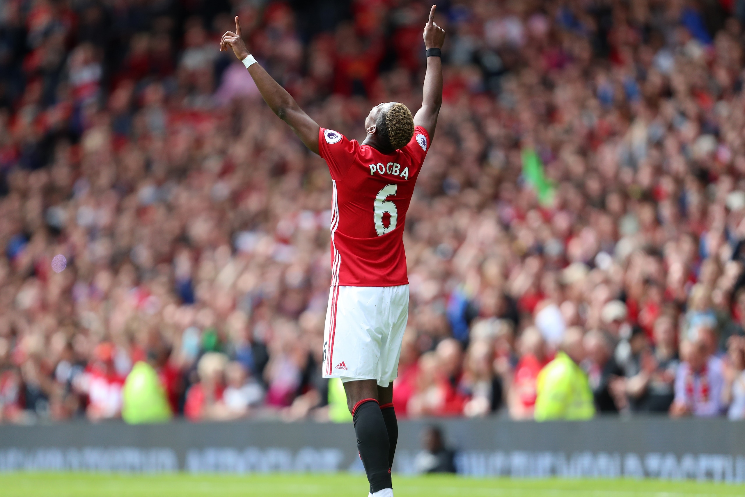 MANCHESTER, ENGLAND - MAY 21: Paul Pogba of Manchester United celebrates after scoring a goal to make it 2-0 during the Premier League match between Manchester United and Crystal Palace at Old Trafford on May 21, 2017 in Manchester, England. (Photo by Jam
