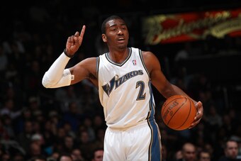 WASHINGTON - DECEMBER 29: John Wall #2 of the Washington Wizards calls a play against the Indiana Pacers at the Verizon Center on December 29, 2010 in Washington, DC. NOTE TO USER: User expressly acknowledges and agrees that, by downloading and or using t