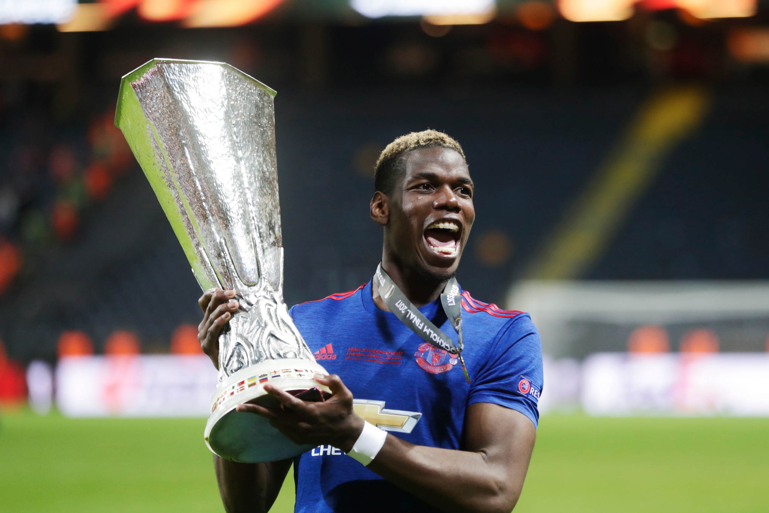 STOCKHOLM, SWEDEN - MAY 24: Paul Pogba of Manchester United with the trophy during the UEFA Europa League Final between Ajax and Manchester United  at Friends Arena on May 24, 2017 in Stockholm, Sweden.  (Photo by Nils Petter Nilsson/Getty Images)