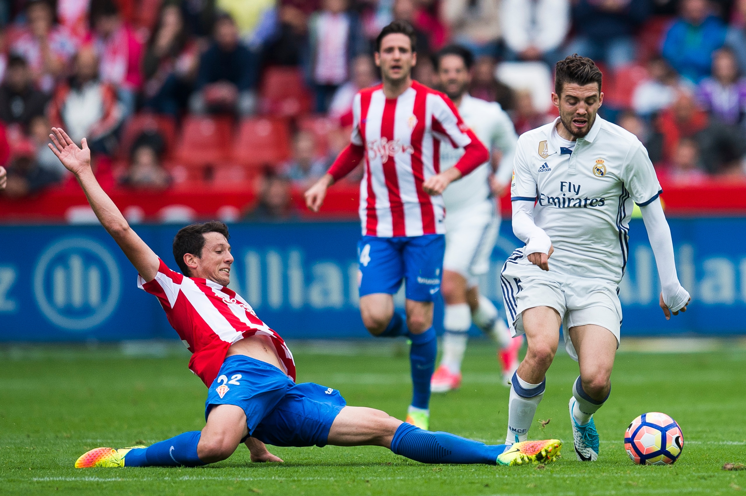 GIJON, SPAIN - APRIL 15: Mateo Kovacic of Real Madrid duels for the ball with Mikel Vesga of Real Sporting de Gijon during the La Liga match between Real Sporting de Gijon and Real Madrid at Estadio El Molinon on April 15, 2017 in Gijon, Spain.  (Photo by