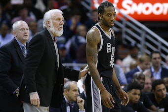 NEW ORLEANS, LA - JANUARY 27: Gregg Popovich of the San Antonio Spurs talks to Kawhi Leonard #2 during the second half of a game against the New Orleans Pelicans at the Smoothie King Center on January 27, 2017 in New Orleans, Louisiana. NOTE TO USER: User