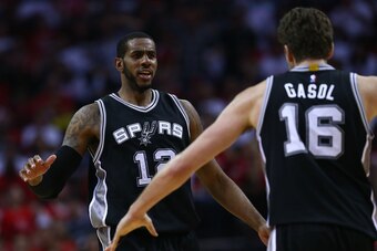 HOUSTON, TX - MAY 05:  LaMarcus Aldridge #12 of the San Antonio Spurs reacts with Pau Gasol #16 against the Houston Rockets during Game Three of the NBA Western Conference Semi-Finals at Toyota Center on May 5, 2017 in Houston, Texas.  NOTE TO USER: User 