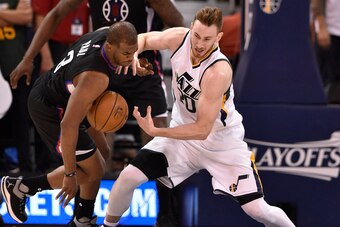 SALT LAKE CITY, UT - APRIL 21:Chris Paul #3 of the Los Angeles Clippers and Gordon Hayward #20 of the Utah Jazz try for the loose ball in the second half of the 111-106 Clipper victory in Game Three of the Western Conference Quarterfinals during the 2017 