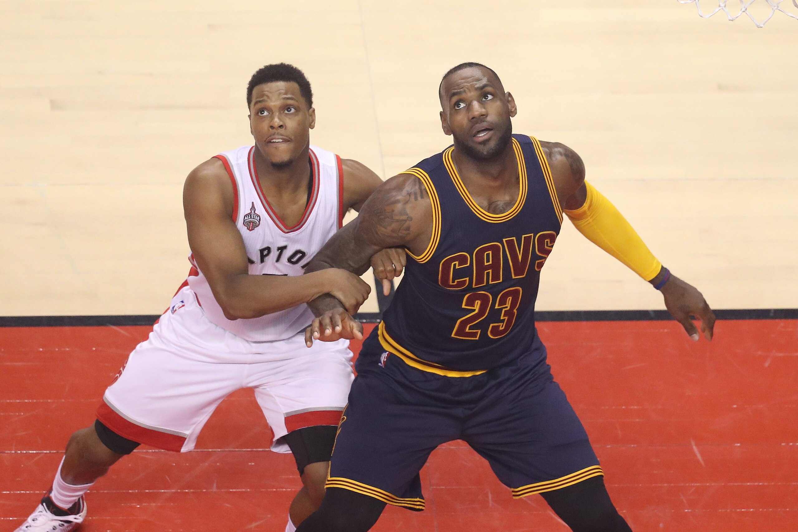 TORONTO, ON - MAY 23: LeBron James #23 of the Cleveland Cavaliers anticipates a rebound as he positions himself against Kyle Lowry #7 of the Toronto Raptors in Game Four of the Eastern Conference Finals during the 2016 NBA Playoffs at the Air Canada Centr