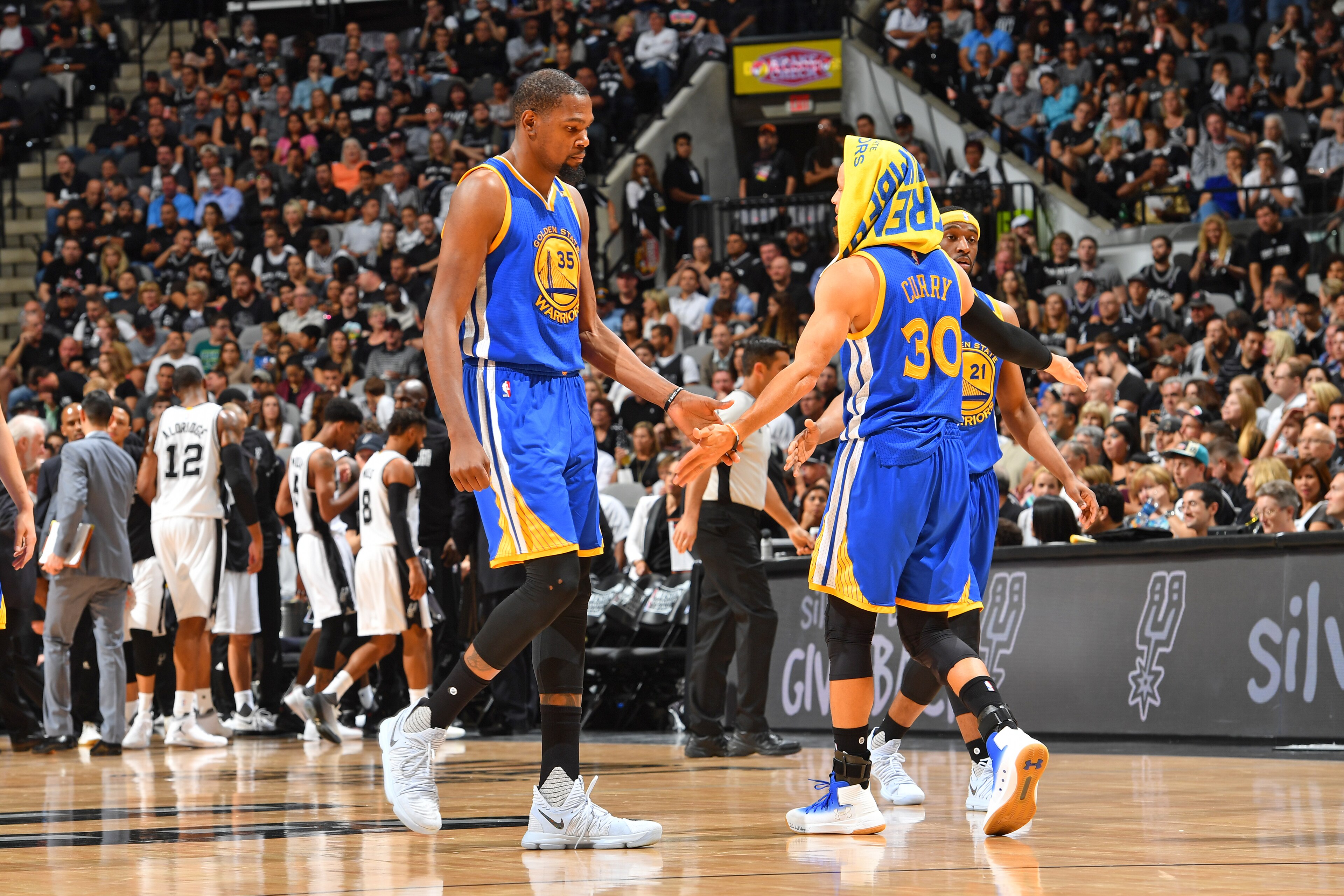 SAN ANTONIO, TX - MAY 22: Stephen Curry #30 and Kevin Durant #35 of the Golden State Warriors high five during the game against the San Antonio Spurs during Game Four of the Western Conference Finals of the 2017 NBA Playoffs on May 22, 2017 at the AT&T C SAN ANTONIO, TX - MAY 22: Stephen Curry #30 and Kevin Durant #35 of the Golden State Warriors high five during the game against the San Antonio Spurs during Game Four of the Western Conference Finals of the 2017 NBA Playoffs on May 22, 2017 at the AT&T C