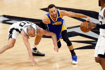 SAN ANTONIO, TX - MAY 22:  Manu Ginobili #20 of the San Antonio Spurs and Stephen Curry #30 of the Golden State Warriors battle for the ball in the second half during Game Four of the 2017 NBA Western Conference Finals at AT&T Center on May 22, 2017 in Sa