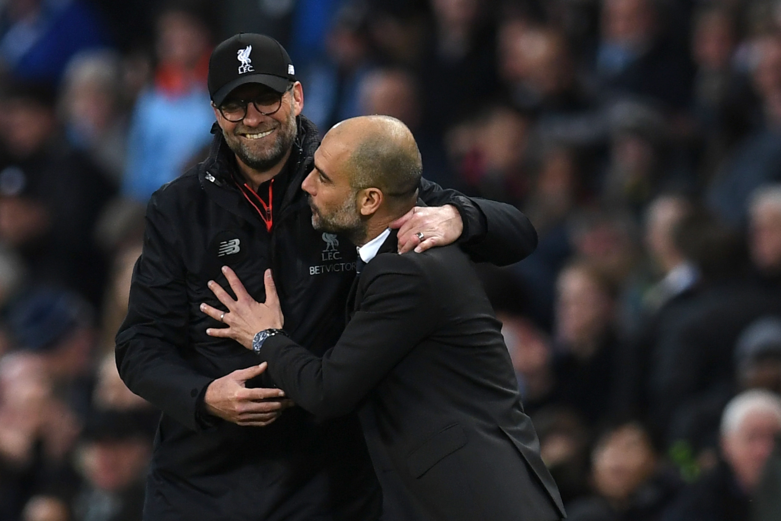 Liverpool's German manager Jurgen Klopp (L) greets Manchester City's Spanish manager Pep Guardiola after the English Premier League football match between Manchester City and Liverpool at the Etihad Stadium in Manchester, north west England, on March 19, Liverpool's German manager Jurgen Klopp (L) greets Manchester City's Spanish manager Pep Guardiola after the English Premier League football match between Manchester City and Liverpool at the Etihad Stadium in Manchester, north west England, on March 19,