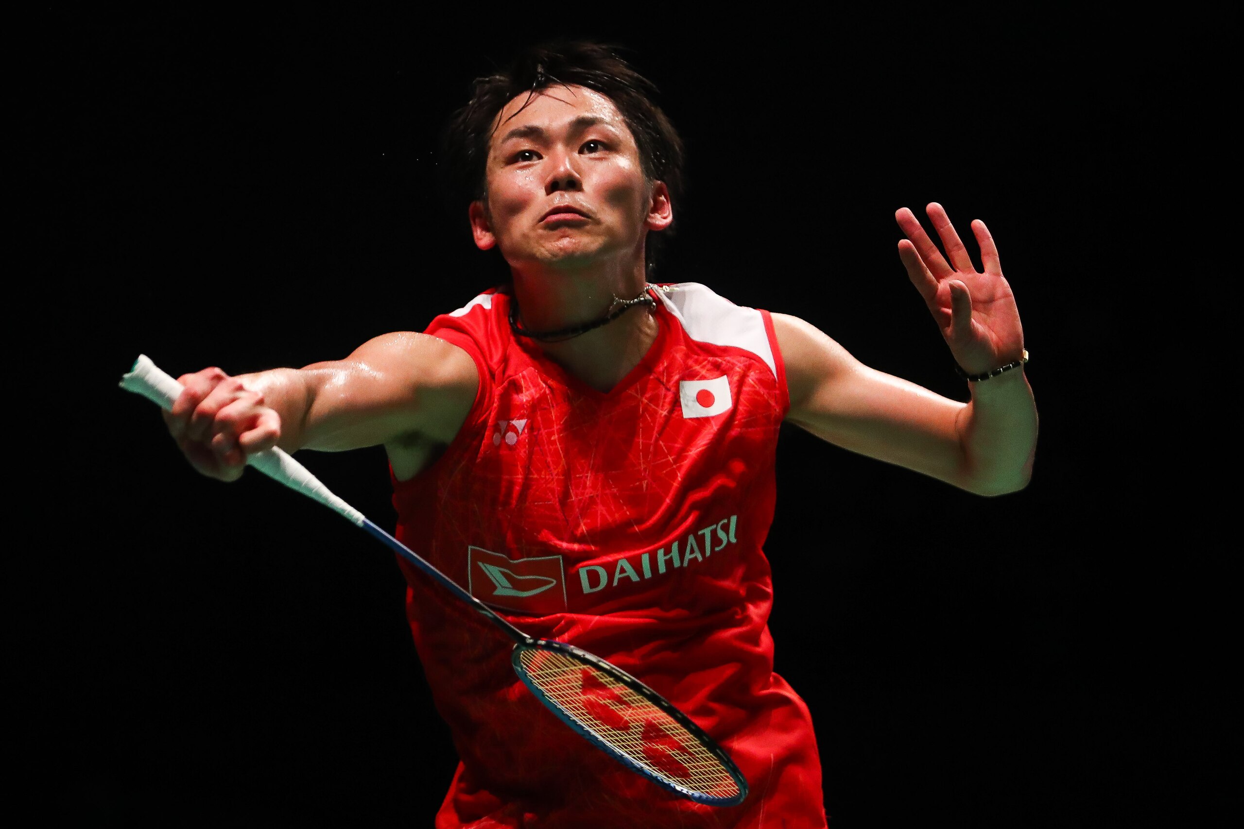 Takeshi Kamura of Japan hits a return with his partner Keigo Sonoda during the men's doubles Sudirman Cup match against Li Junhui and Liu Yuchen of China at the Gold Coast Sports Centre on May 27, 2017.  / AFP PHOTO / Patrick HAMILTON / -- IMAGE RESTRICTE