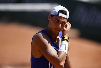 Spain's Rafael Nadal gestures during a practice session against France's Lucas Pouille on the eve of the first round of the Roland Garros 2017 French Tennis Open on May 27, 2017 in Paris.  / AFP PHOTO / Gabriel BOUYS        (Photo credit should read GABRI