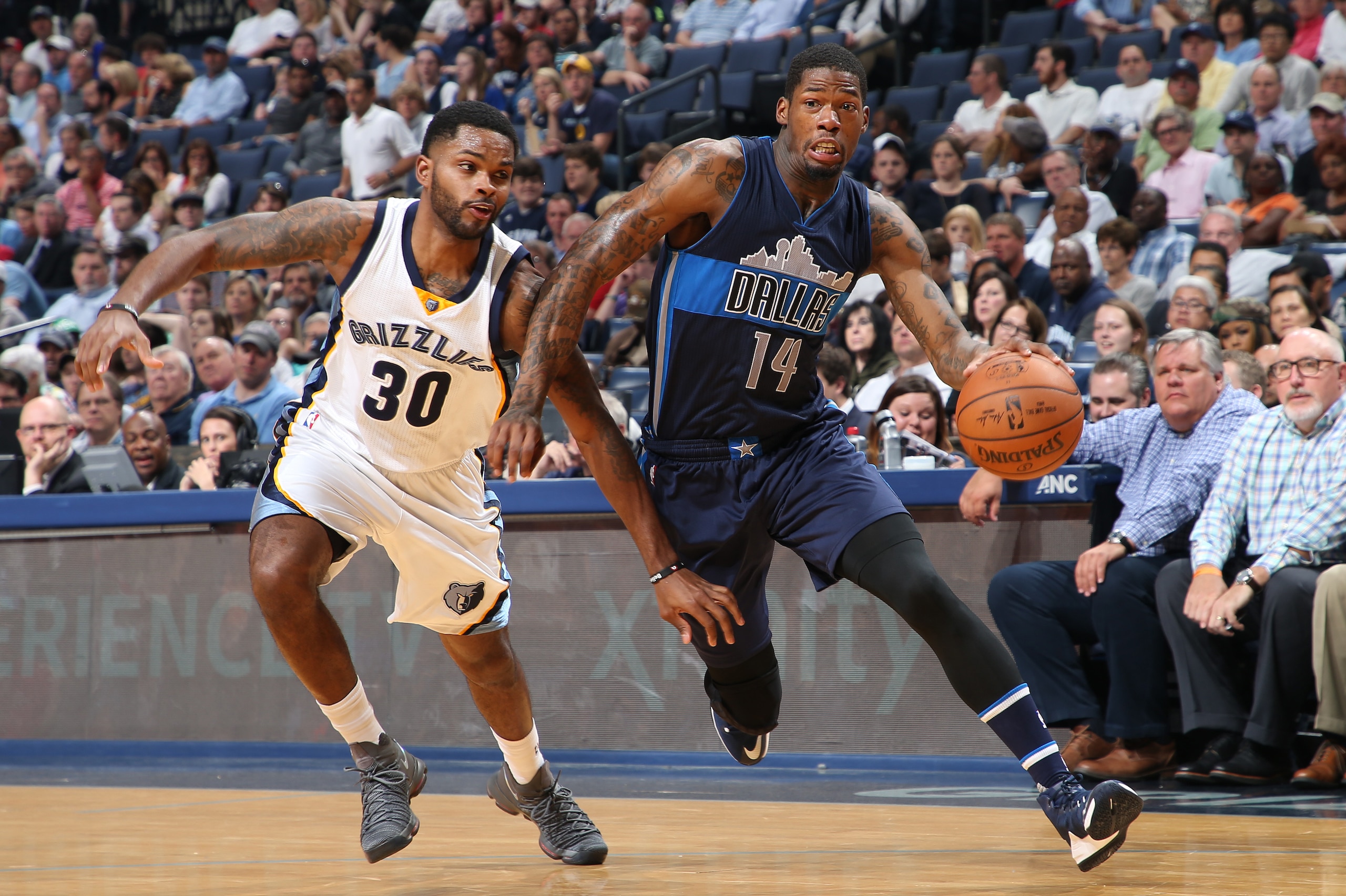 MEMPHIS, TN - APRIL 12:  DeAndre Liggins #14 of the Dallas Mavericks drives to the basket against the Memphis Grizzlies on April 12, 2017 at FedEx Forum in Memphis, Tennessee. NOTE TO USER: User expressly acknowledges and agrees that, by downloading and/o