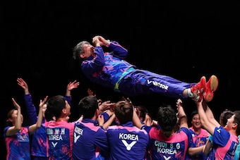 GOLD COAST, AUSTRALIA - MAY 28:  Korea coach Kang Kyung Jin is thrown in the air after winning the Final match against China during the Sudirman Cup at the Carrara Sports & Leisure Centre on May 28, 2017 in Gold Coast, Australia.  (Photo by Chris Hyde/Get