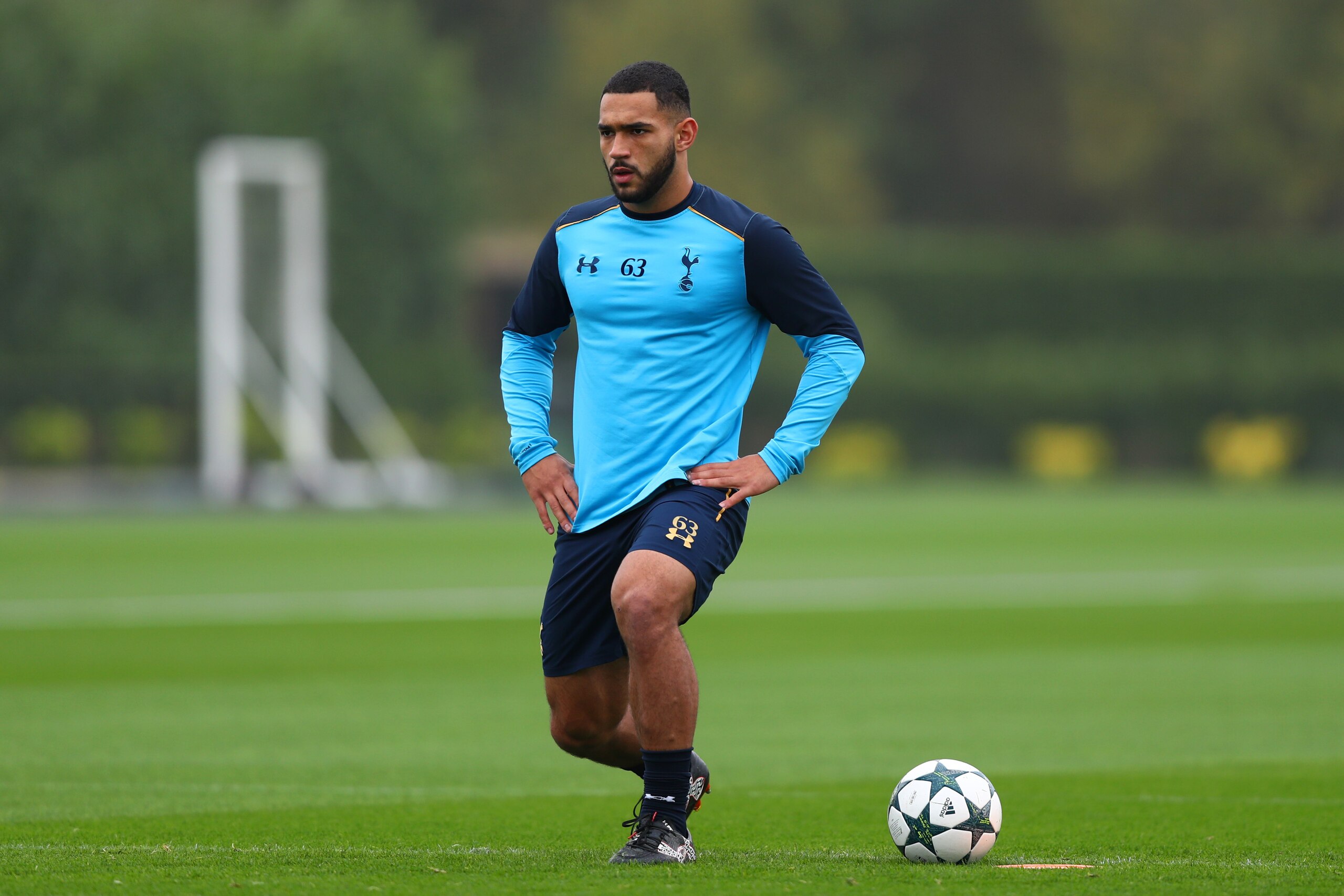 ENFIELD, ENGLAND - NOVEMBER 01: Cameron Carter-Vickers stretches during a Tottenham Hotspur training session ahead of their UEFA Champions League Group E match against Bayer 04 Leverkusen at the Tottenham Hotspur Training Centre on November 1, 2016 in En ENFIELD, ENGLAND - NOVEMBER 01: Cameron Carter-Vickers stretches during a Tottenham Hotspur training session ahead of their UEFA Champions League Group E match against Bayer 04 Leverkusen at the Tottenham Hotspur Training Centre on November 1, 2016 in En