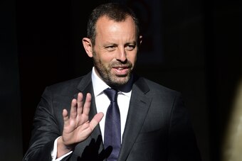 Former President of football club Barcelona Sandro Rosell gestures as he arrives at Madrid's National Court on July 22, 2014. Investigating judge Pablo Ruz cited ex-Barcelona president Sandro Rosell as a tax crime suspect over the 86-million-euro ($117 mi