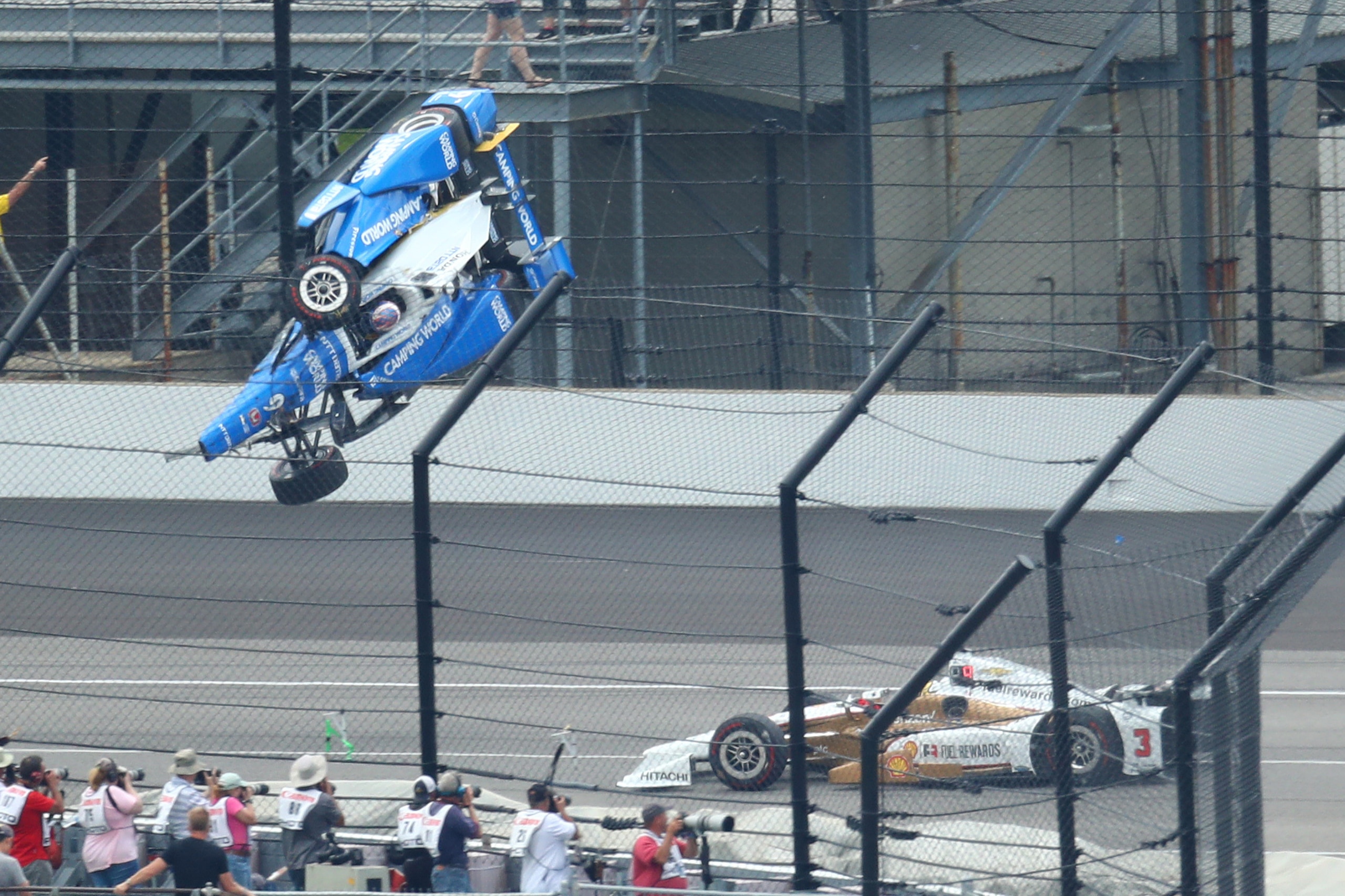May 28, 2017; Indianapolis, IN, USA; IndyCar Series driver Scott Dixon (9) goes airborne and crashes in front of Helio Castroneves (3) during the 101st Running of the Indianapolis 500 at Indianapolis Motor Speedway. Mandatory Credit: Mark J. Rebilas-USA T May 28, 2017; Indianapolis, IN, USA; IndyCar Series driver Scott Dixon (9) goes airborne and crashes in front of Helio Castroneves (3) during the 101st Running of the Indianapolis 500 at Indianapolis Motor Speedway. Mandatory Credit: Mark J. Rebilas-USA T
