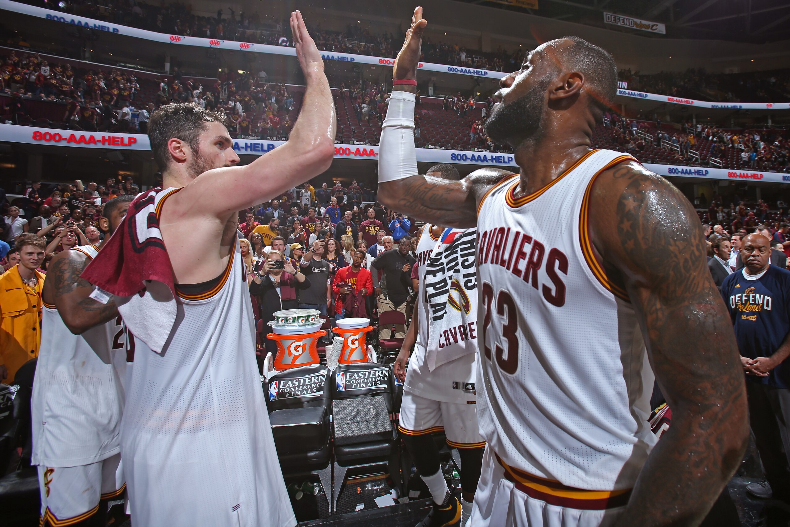 CLEVELAND, OH - MAY 23:  Kevin Love #0 and LeBron James #23 of the Cleveland Cavaliers high five after Game Four of the Eastern Conference Finals against the Boston Celtics during the 2017 NBA Playoffs on May 23, 2017 at Quicken Loans Arena in Cleveland, 