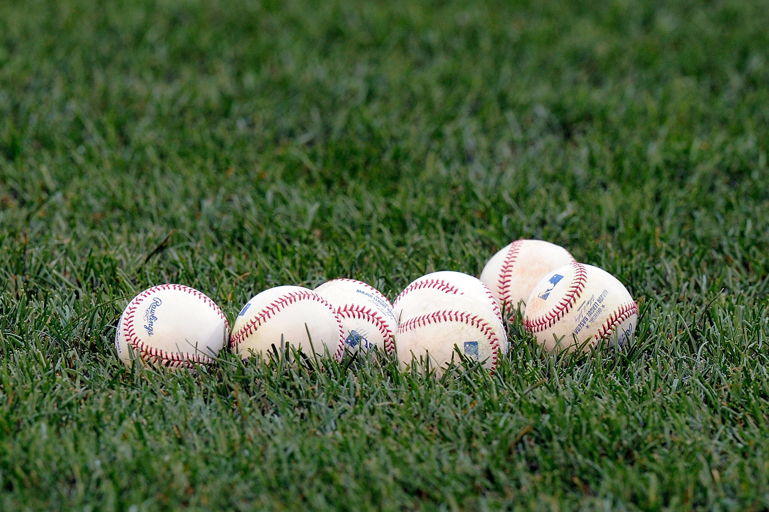 BALTIMORE, MD - JULY 27:  A pile of baseballs on the field before the game between the Boston Red Sox and the Baltimore Orioles at Oriole Park at Camden Yards on July 27, 2013 in Baltimore, Maryland.  (Photo by G Fiume/Getty Images)