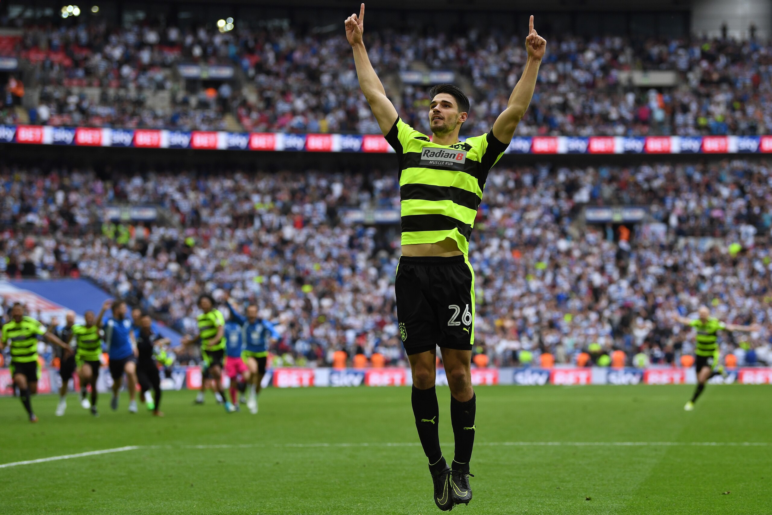 LONDON, ENGLAND - MAY 29:  Christopher Schindler of Huddersfield Town celebrates scoring the winning penalty in the penalty shoot out after the Sky Bet Championship play off final between Huddersfield and Reading at Wembley Stadium on May 29, 2017 in Lond