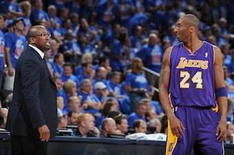 OKLAHOMA CITY, OK - MAY 21:  Kobe Bryant #24 of the Los Angeles Lakers looks at  Head Coach Mike Brown of the Los Angeles Lakers in Game Five of the Western Conference Semifinals between the Los Angeles Lakers and the Oklahoma City Thunder during the 2012