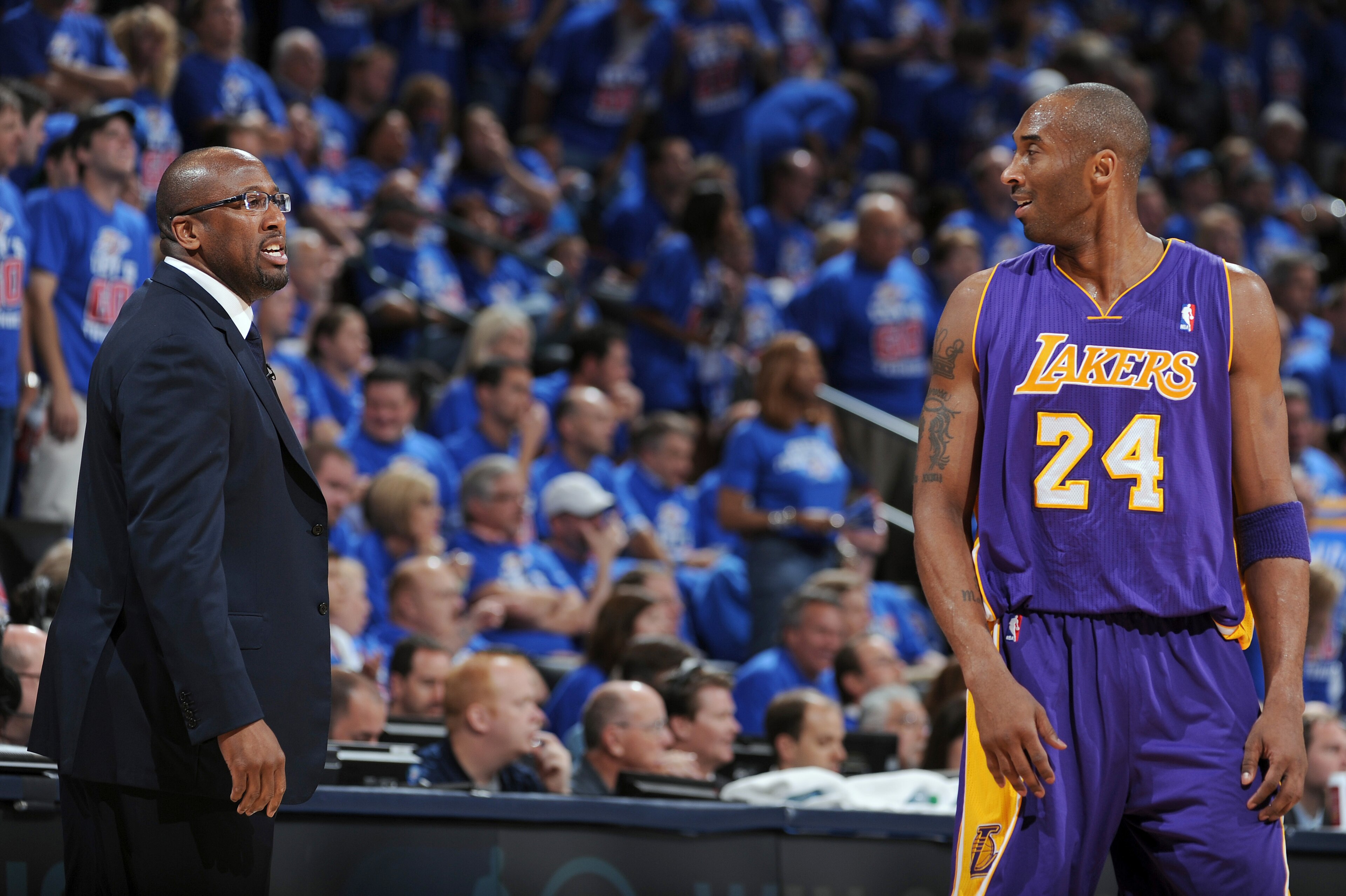 OKLAHOMA CITY, OK - MAY 21:  Kobe Bryant #24 of the Los Angeles Lakers looks at  Head Coach Mike Brown of the Los Angeles Lakers in Game Five of the Western Conference Semifinals between the Los Angeles Lakers and the Oklahoma City Thunder during the 2012