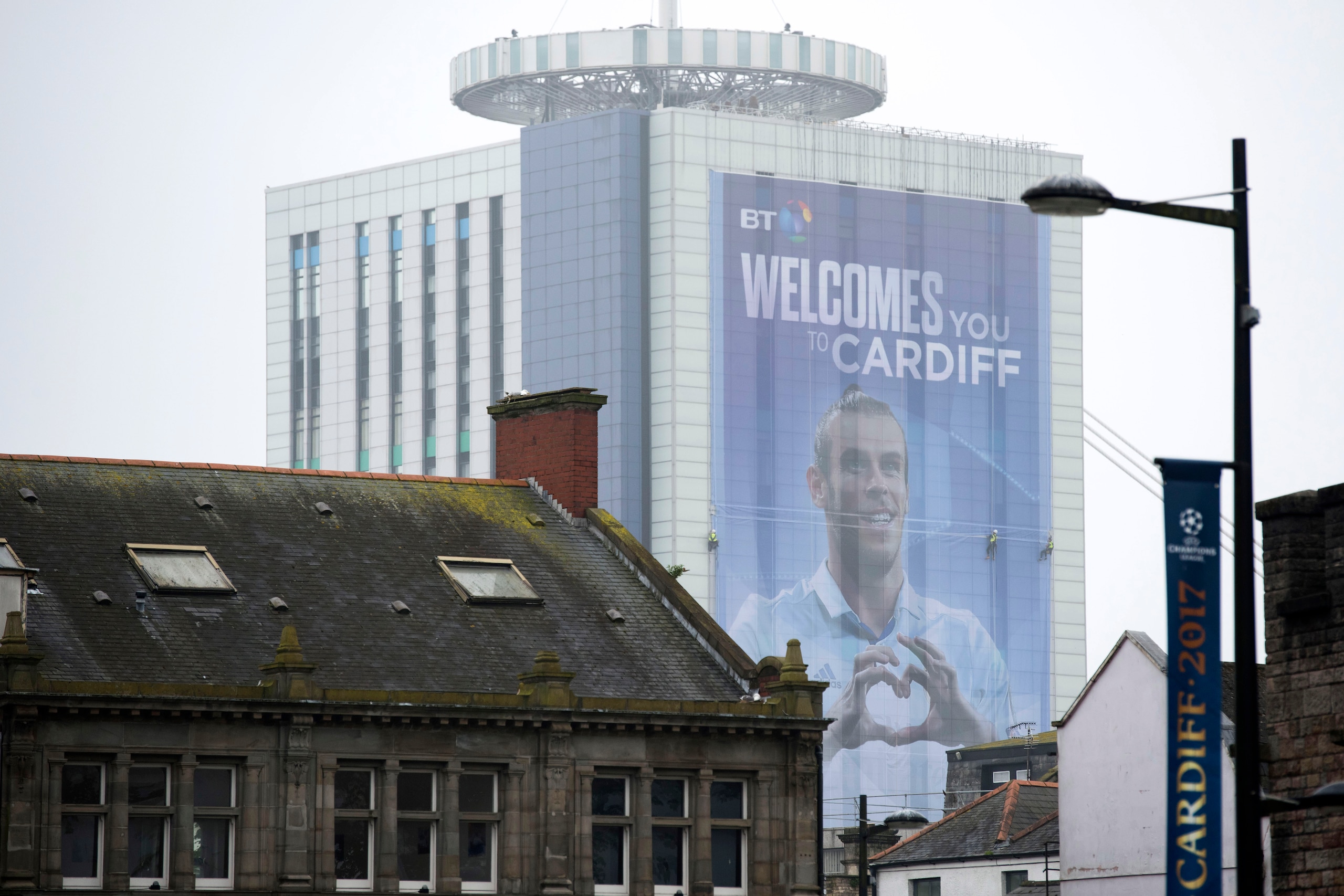 CARDIFF, WALES - MAY 29:  A large banner showing Wales international and Real Madrid player Gareth Bale is seen being fitted to the BT builing in Cardiff city centre on May 29, 2017 in Cardiff, Wales. Preparations are underway for the UEFA Champions Leagu