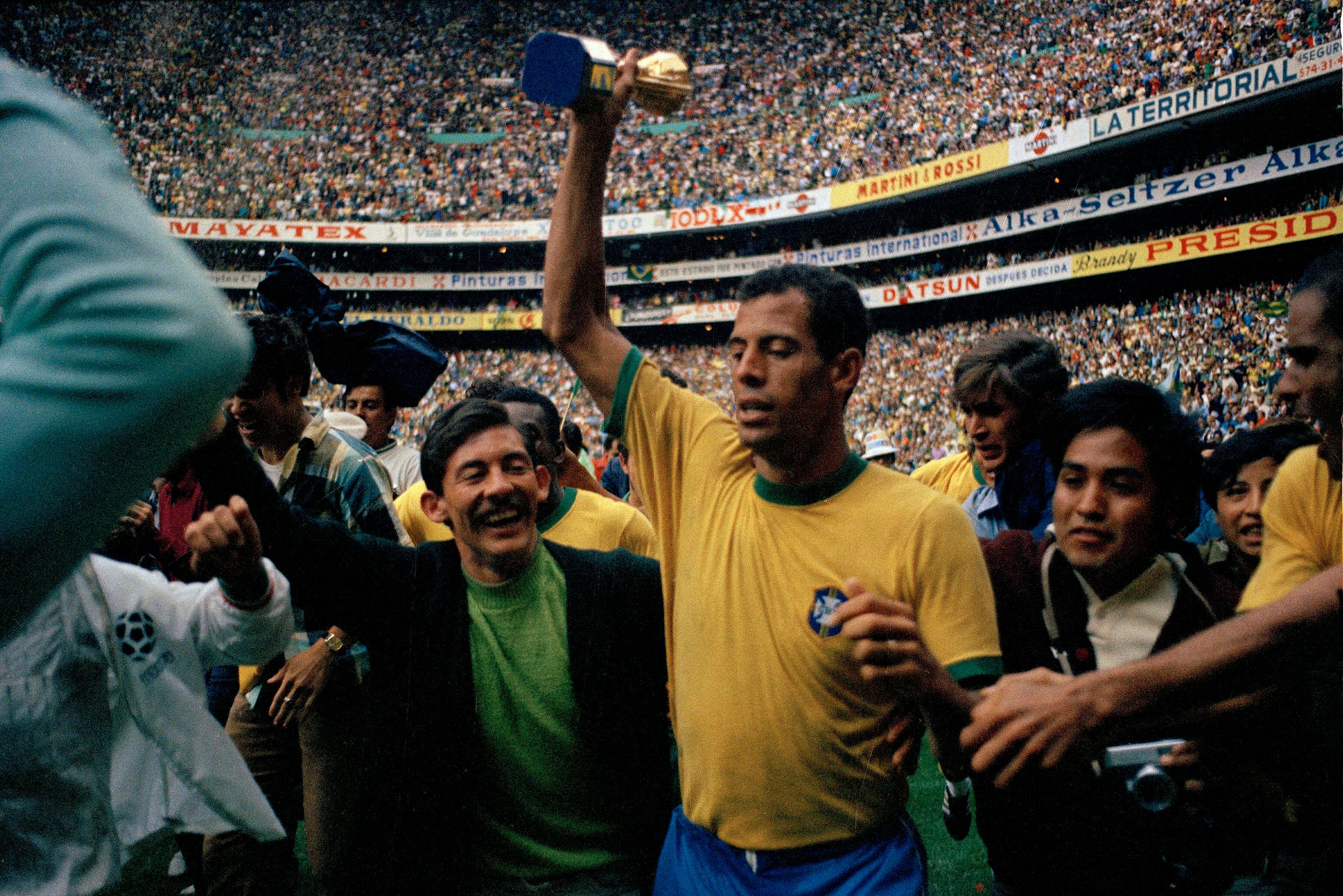 Carlos Alberto celebrates with the World Cup after the 1970 final