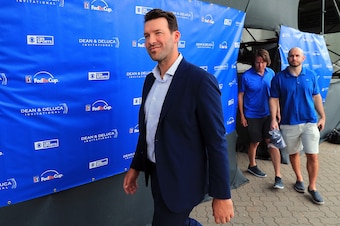 FORT WORTH, TX - MAY 27:  Former Dallas Cowboys quarterback and on-air talent Tony Romo exits the broadcast booth during Round three of the DEAN & DELUCA Invitational at Colonial Country Club on May 27, 2017 in Fort Worth, Texas.  (Photo by Tom Pennington