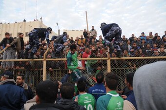 Trouble flares at Gaza Municipal Stadium.